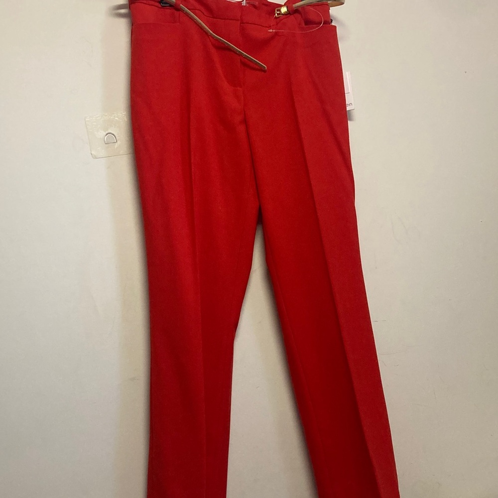 Calvin Klein ladies Bold Red Dress Pants with a slim gold belt.